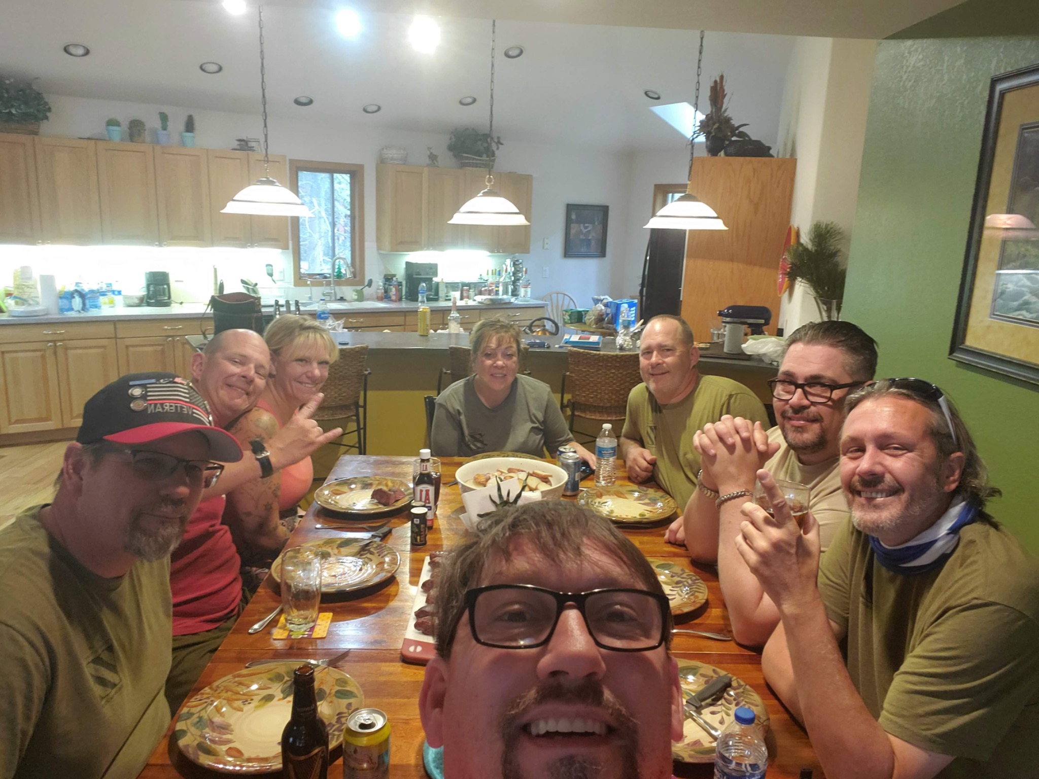 Friends gathered around a table in Georgetown, Colorado, before steak dinner